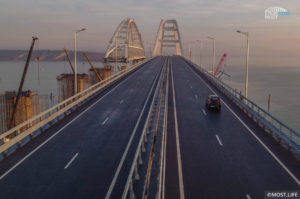 The freeway over the bridge, with its two lanes in each direction.